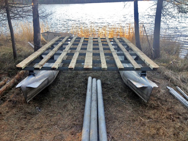 The pontoon boat after being stripped down to its bare bones.